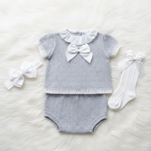 Grey baby girl knitted set on white background